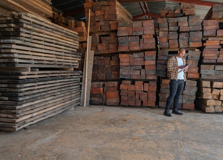 Stacks of wood in the lumberyard are the result of a landowner who was able to sell walnut wood in Cass County IL